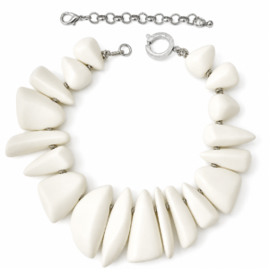 Elegant white Dior necklace featuring large matte sculptural beads in tapered geometric shapes with silver chain links and circular clasp, showcasing a modern, minimalist design.
