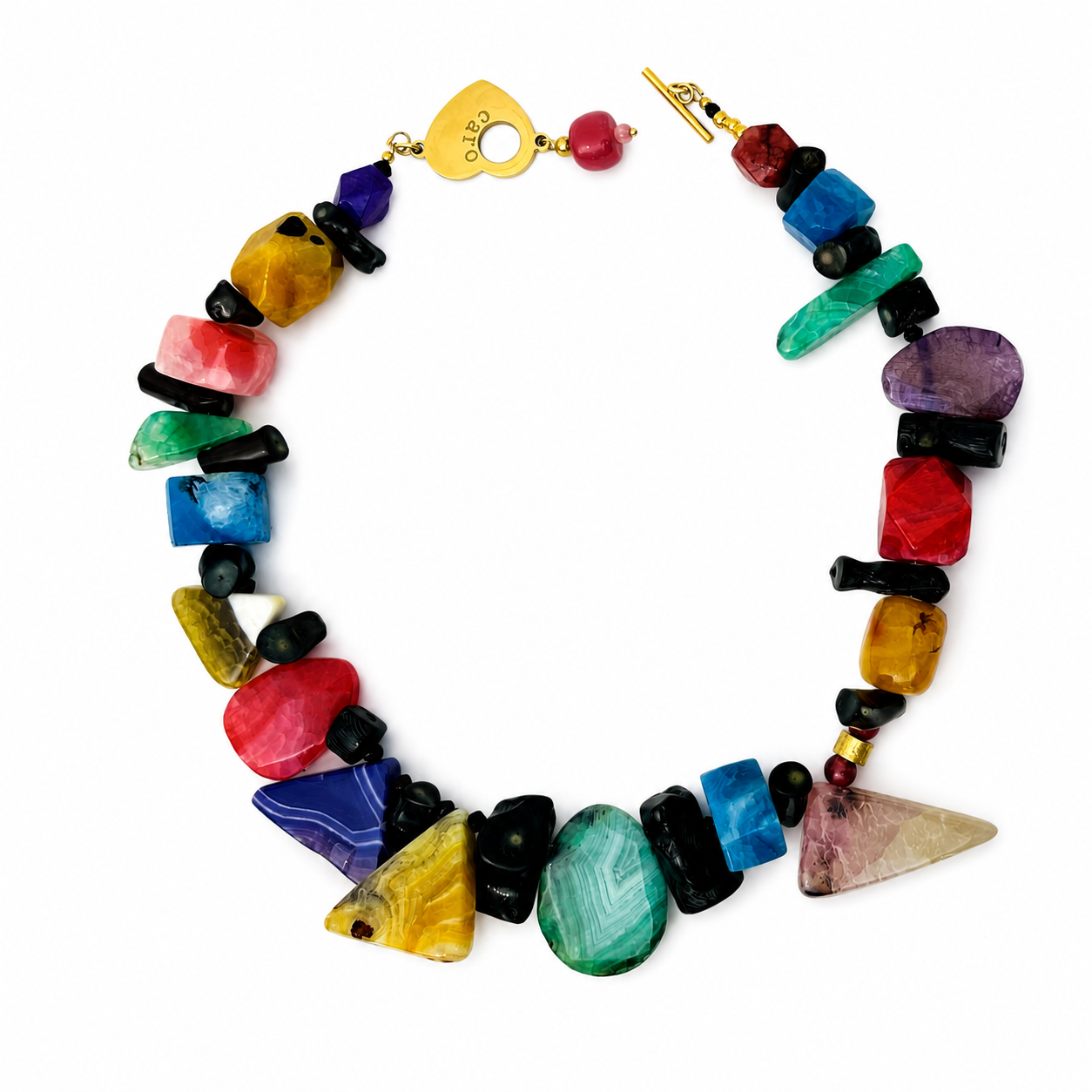 Handcrafted multicolor beaded necklace featuring irregularly shaped stones in vivid hues of red, yellow, blue, green, and purple, finished with a gold heart toggle clasp engraved “CARO.”
