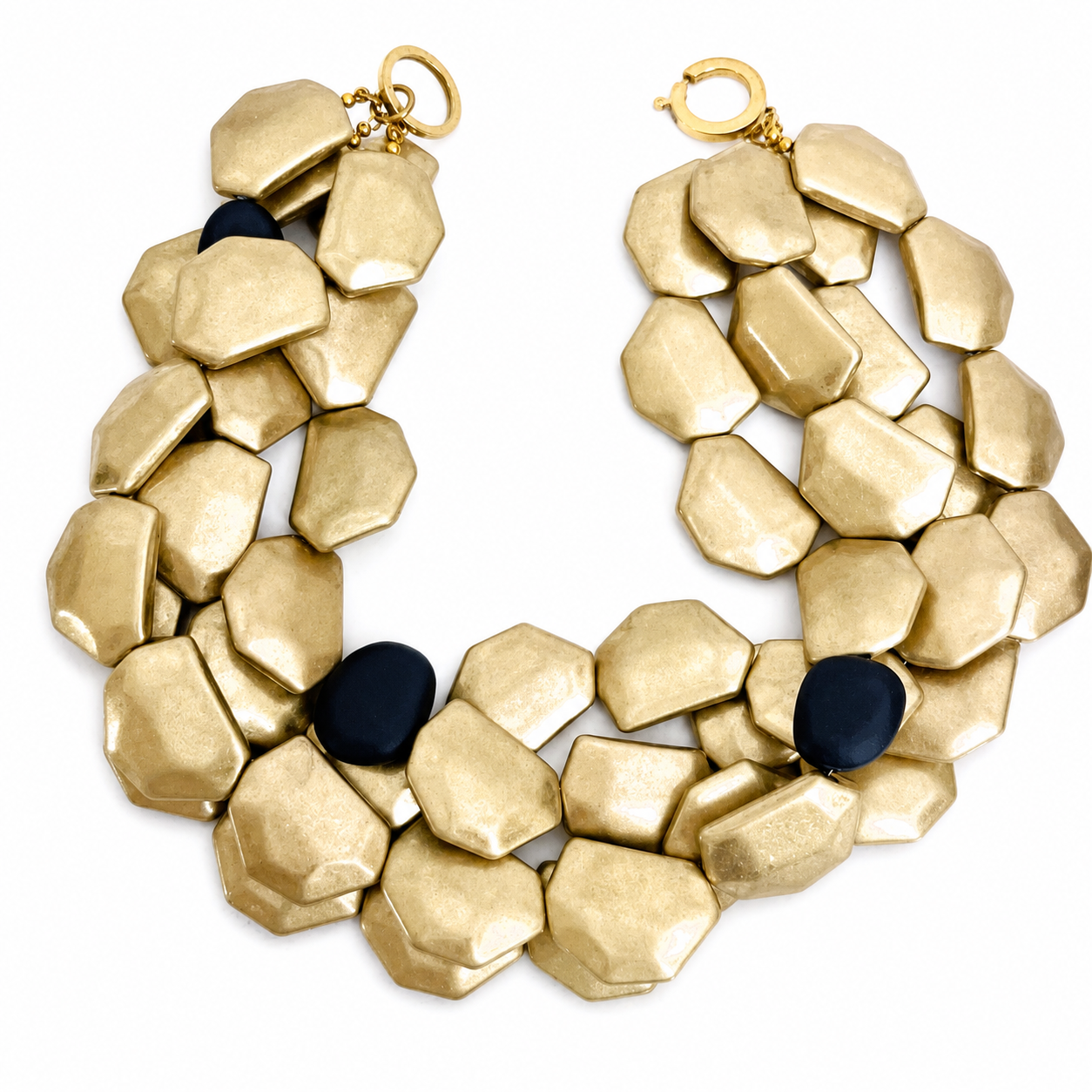 Handcrafted necklace featuring smooth matte black beads arranged in a uniform strand, designed to sit comfortably at 17 inches with a secure clasp. The matte finish highlights modern, sculptural elegance.