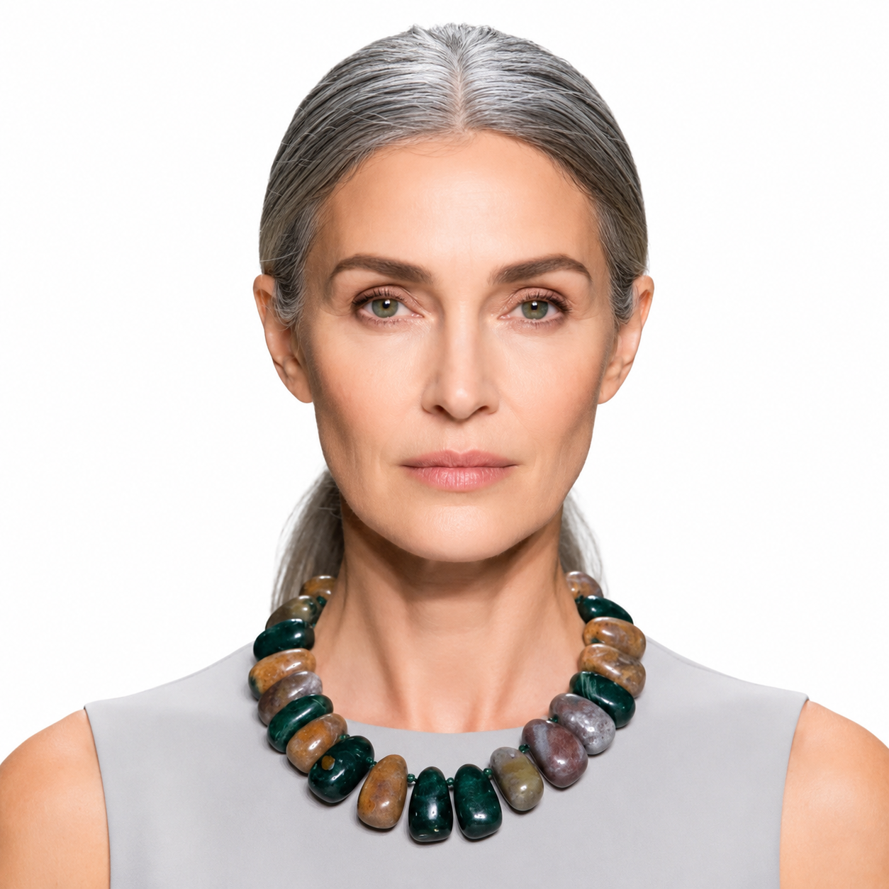 Handcrafted Indian Agate necklace featuring individually knotted beads in earthy russet, green, olive, and cream tones. Each bead is polished by hand, highlighting natural texture and organic luster.