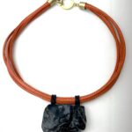 Natural black Coral pendant with multistrand PU leather. Unusual find of raw coral.