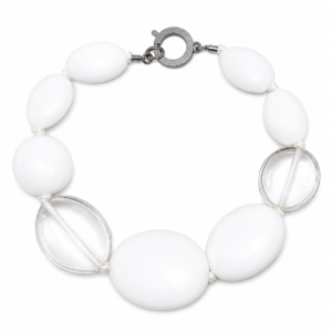 Handcrafted Matte White & Clear Bead Statement Necklace featuring large oval matte white acrylic beads and two clear accent beads, connected by a silver circular clasp engraved “Caro.” Displayed on a white background, highlighting its modern, minimalist design and balanced composition.