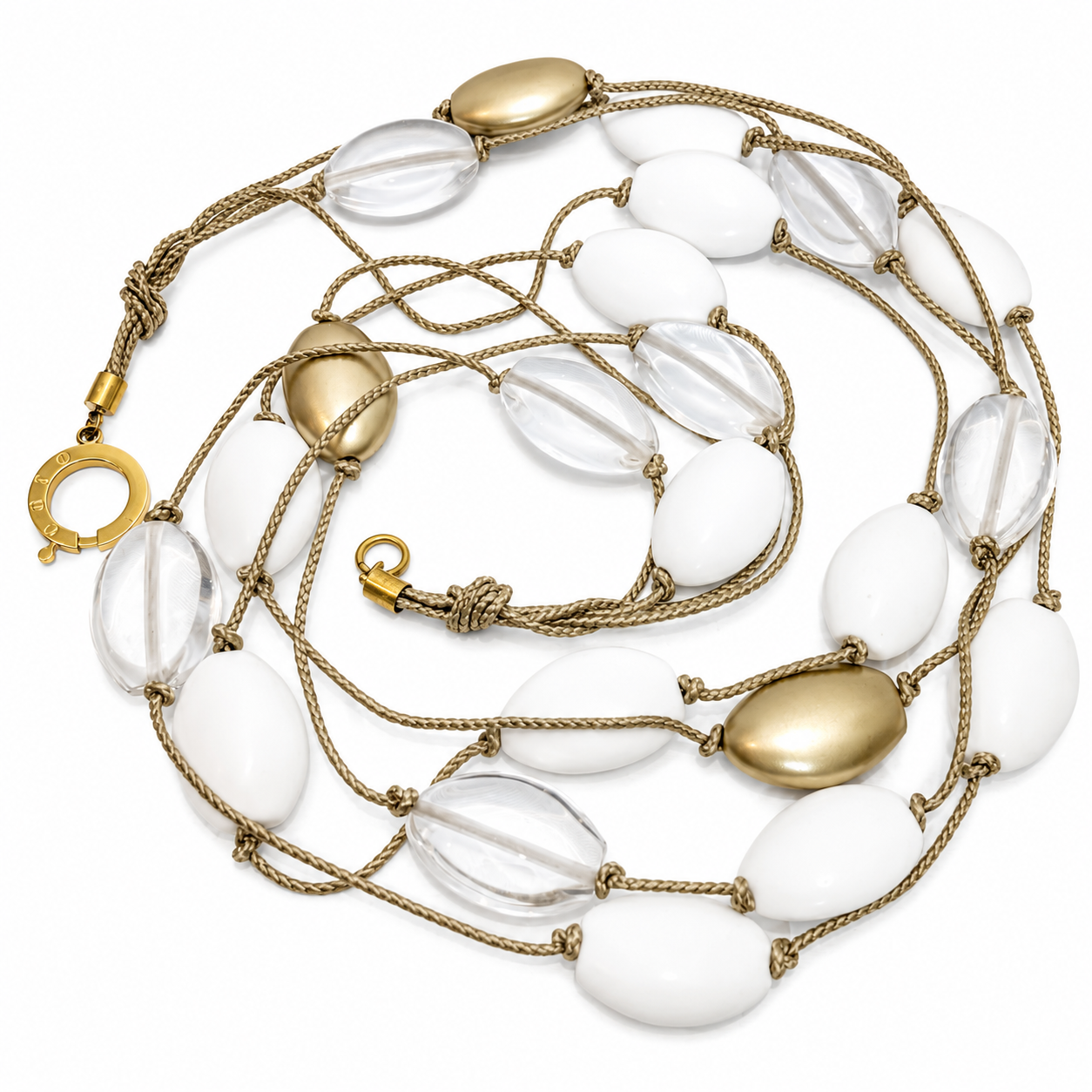 Four‑strand necklace featuring lightweight gold nylon cords adorned with snow‑white and honey‑gold resin beads. Long 36‑inch silhouette designed to drape gracefully and elongate the torso.