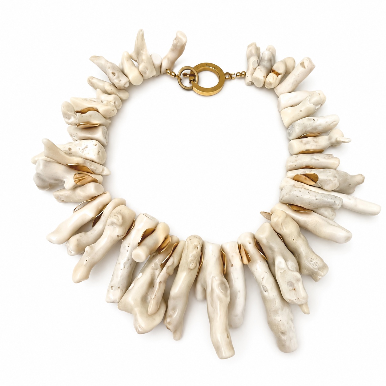 Handcrafted natural coral necklace featuring irregular cream‑colored coral branches with subtle beige and ivory tones, connected by a polished gold circular clasp engraved “Caro.” Displayed on a white background, highlighting its organic texture and elegant simplicity.
