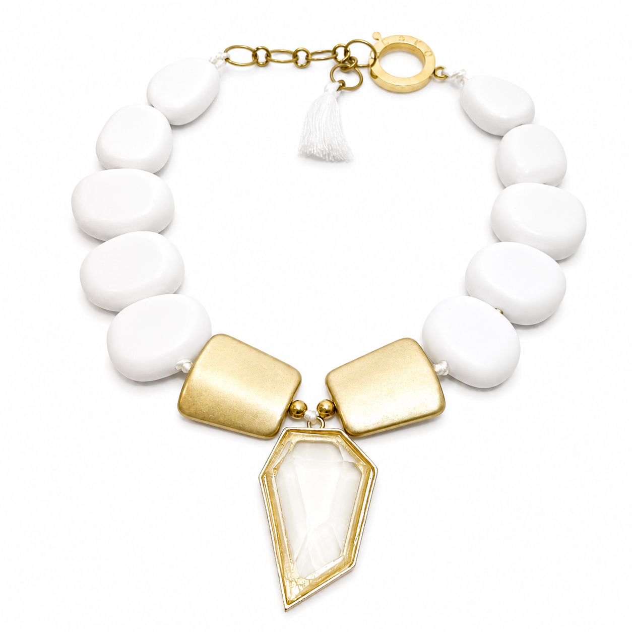 White and gold choker necklace featuring matte white resin beads, two gold accent beads, and a clear geometric acrylic pendant displayed on a white background.