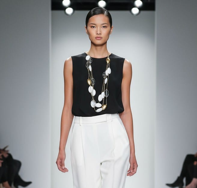 Discover effortless sophistication with this 36-inch multi-strand necklace, designed to bring timeless beauty to your everyday style. Crafted with four strands of lightweight gold nylon cord, it drapes gracefully while remaining comfortable for all-day wear. The necklace is adorned with a striking mix of snow-white and gold resin beads, creating a luminous contrast that instantly elevates any outfit. Unlike heavy statement jewelry, this piece offers the bold look of large beads without the bulk. Its lightweight design ensures easy wear, while the layered strands add depth and movement. Whether styled with a crisp blouse for work or paired with an elegant dress for evening occasions, this necklace transitions seamlessly from day to night. The golden tones radiate a Honeyed warmth, perfectly balanced by the purity of white beads. This Honeyed glow enhances the necklace’s versatility, making it a standout accessory for both casual and formal looks. With its Honeyed elegance and modern simplicity, this necklace is destined to become a staple in your jewelry collection.  Celebrate the harmony of comfort and style with a piece that embodies understated luxury and effortless charm.