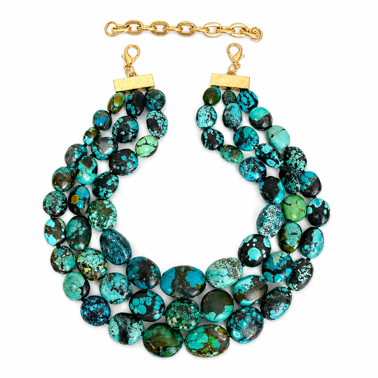 Three‑strand genuine green turquoise necklace featuring polished oval stones with natural mineral patterns and gold‑tone clasp.