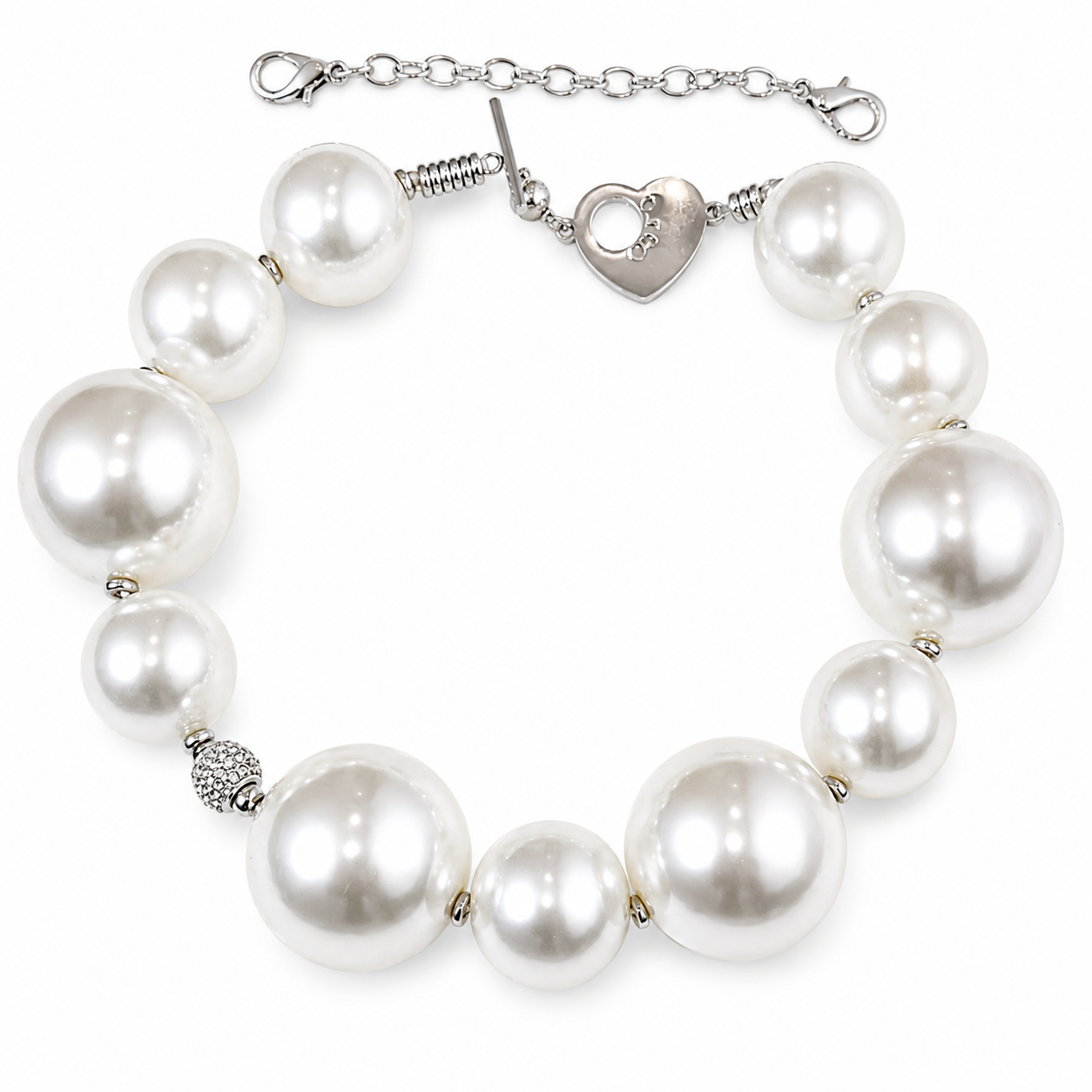 Statement choker necklace featuring oversized glossy simulation pearls in graduated sizes with silver toggle clasp and extender chain on a white background.
