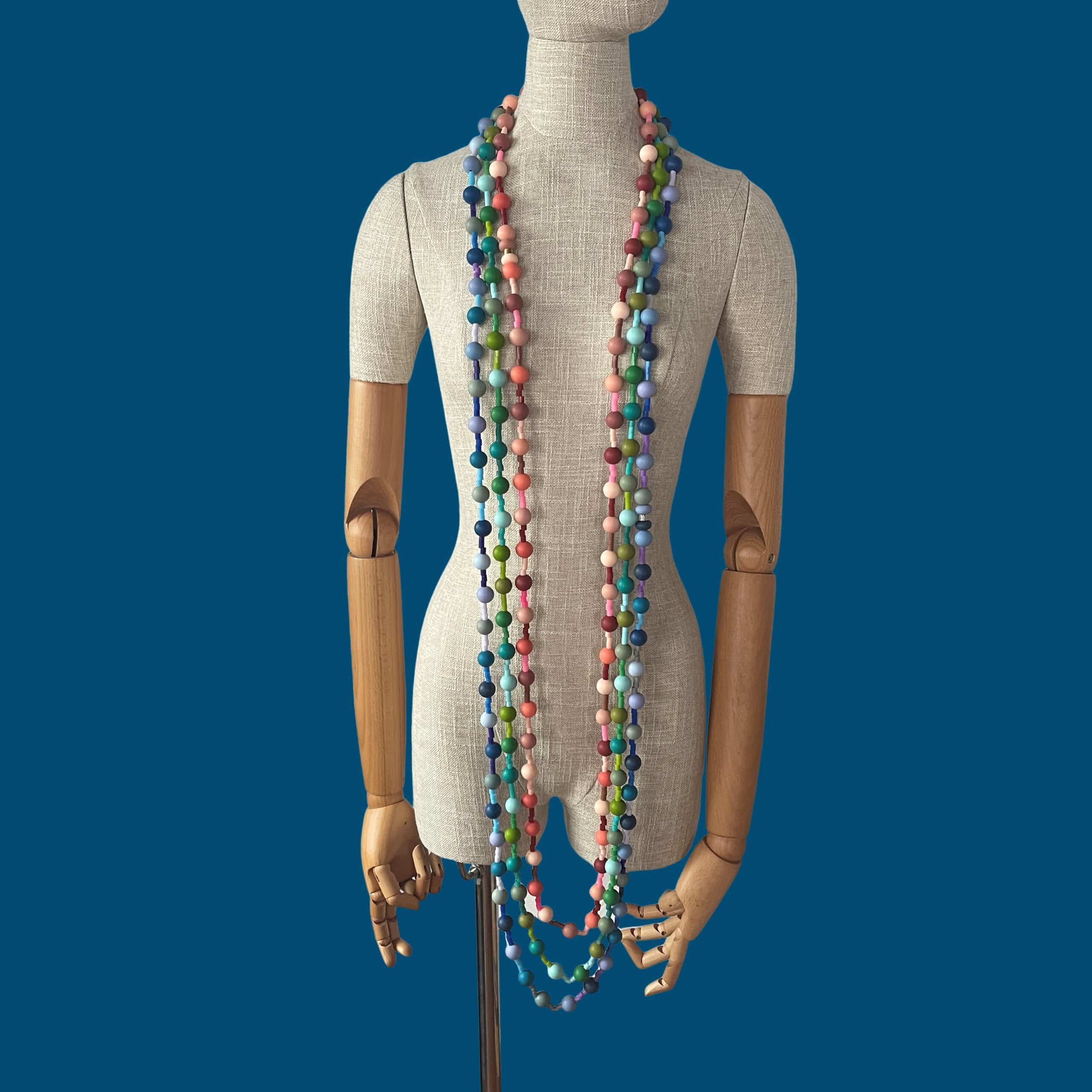 Add effortless charm to your everyday style with this elegant set of blue long necklace combo, designed to blend comfort, durability, and eye-catching simplicity. Each necklace measures 37 inches in length and features soft, silky silicone beads in delicate pastel hues—blue, peach, and green—creating a trio that’s both soothing and stylish. The blue long necklace combo is lightweight design, these necklaces offer all-day comfort without compromising sophistication. The smooth silicone beads provide a gentle, modern aesthetic that’s perfect for casual wear, yet refined enough to elevate a weekend brunch look or a breezy work ensemble. This set is suitable to be in contact with water without damaging the beads.  The extra-long length allows versatile styling—wear one solo for a minimalist statement or layer all three for a vibrant, contemporary stack. Built with high-quality materials, each necklace in the set of the blue long necklace is crafted to last, offering longevity that matches its timeless appeal. Whether you’re curating your own jewelry collection or gifting to someone who loves thoughtful accessories, this set is a beautiful balance of form and function. From soft pastel tones to its refined silhouette, this trio delivers style that feels as good as it looks—an easy favorite for daily wear with an understated elegance that speaks for itself.