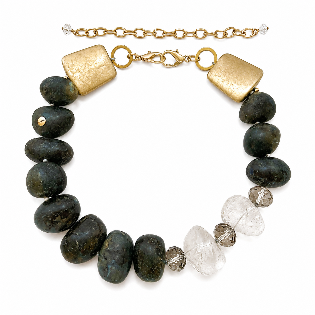 Handcrafted necklace featuring large polished labradorite stones in deep green hues, interspersed with clear quartz and faceted crystal accent beads, finished with gold-tone square connectors and a lobster clasp attached to a short gold chain extender, displayed on a white background