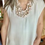 Natural and original seashells and pearls. A chunky necklace to wear as a chocker as a collar. The necklace measures 16 INC/41 CM, or as long as 21 INC/53 CM.