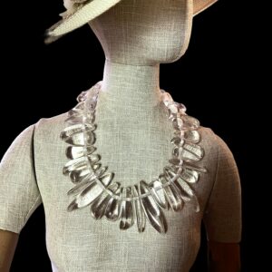 Clear irregular resin beads.  Collar-style statement necklace.  24INC/61CM, 14 ounces.  It is a beautiful artistic statement necklace for the bold. 