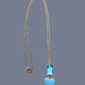 18K gold plated chain with baby blue Chrystal and blue heart pendant in gold color.  The chain measures 19.5IN/50CM/1OZ.  A delicate and minimalist look for the one you love.  