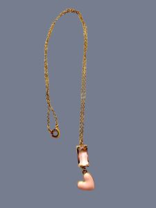 The Valentine Heart and the Chrystal are gold in color and are in an 18K gold-plated chain and clasp.  The chain measures 19.5IN/50CM/1OZ.  A sweetheart look. 