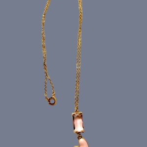 The Valentine Heart and the Chrystal are gold in color and are in an 18K gold-plated chain and clasp.  The chain measures 19.5IN/50CM/1OZ.  A sweetheart look. 