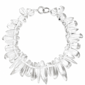 Statement necklace composed of irregular transparent resin beads arranged in a collar-style design. Each bead is elongated and polished, creating a sculptural, crystalline effect that reflects light beautifully against a white background.