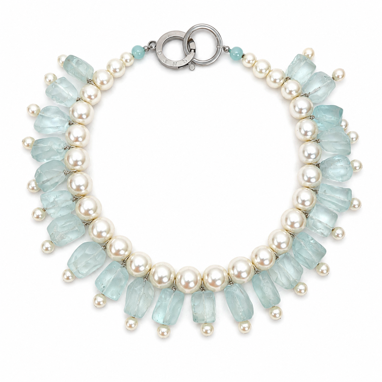 Handcrafted necklace featuring alternating large white pearls and translucent aquamarine glass beads. Each glass bead is irregularly shaped, creating a tumbled effect, and is accented with smaller pearls. The necklace includes a silver circular clasp and extender chain for adjustable length.