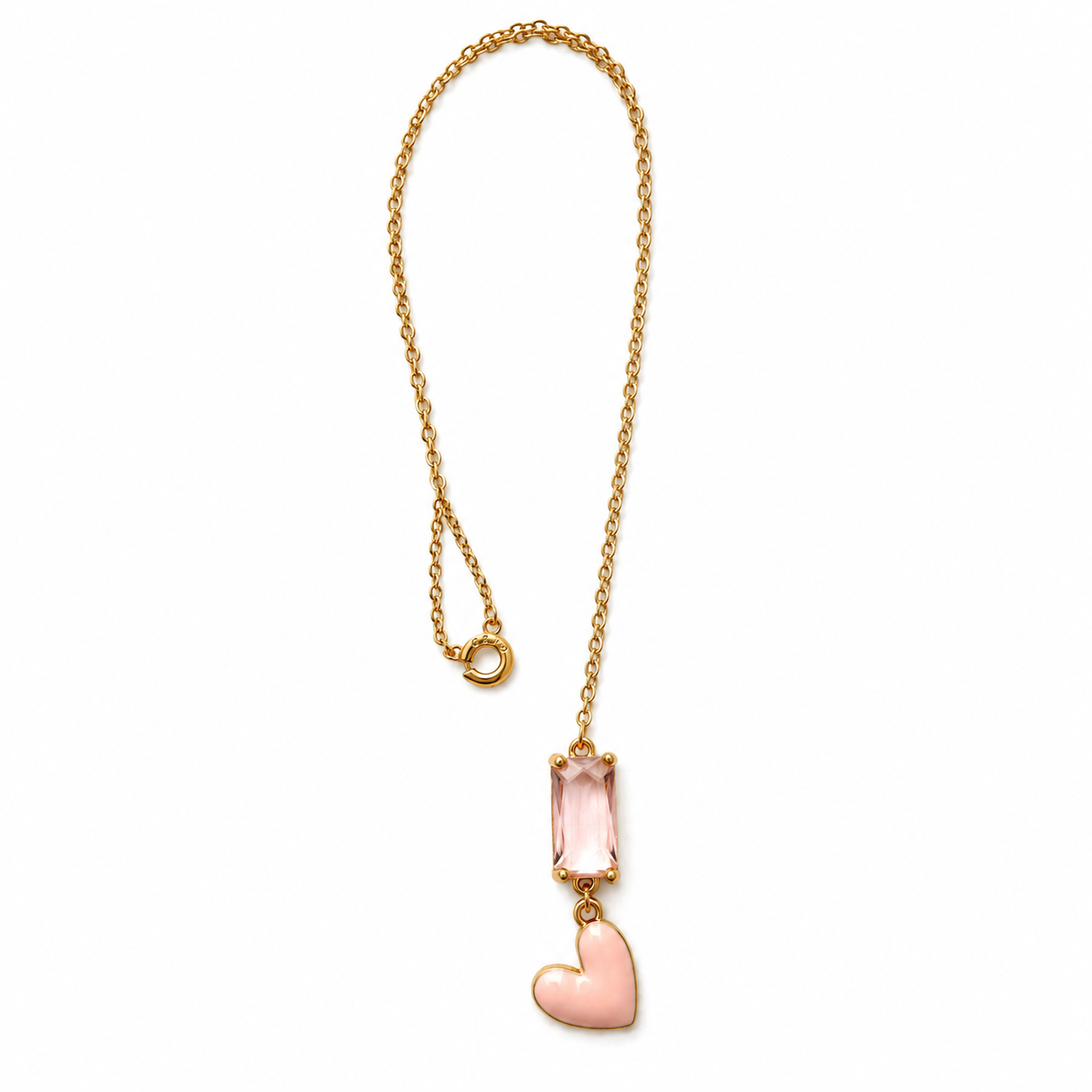 Gold chain necklace featuring a rectangular pink gemstone and a soft pink heart pendant outlined in gold. The design is delicate and feminine, combining geometric precision with romantic curves.
