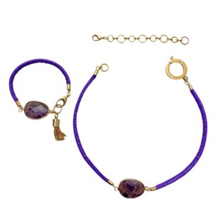 This is a choker necklace and bracelet set. The necklace has a single Amethyst pendant and a matching bracelet. The pendant is a faceted Amethyst natural stone on a purple vegan leather cord. The necklace measures 16 IN/2 OZ and includes an extender to make it up to 20 IN long.