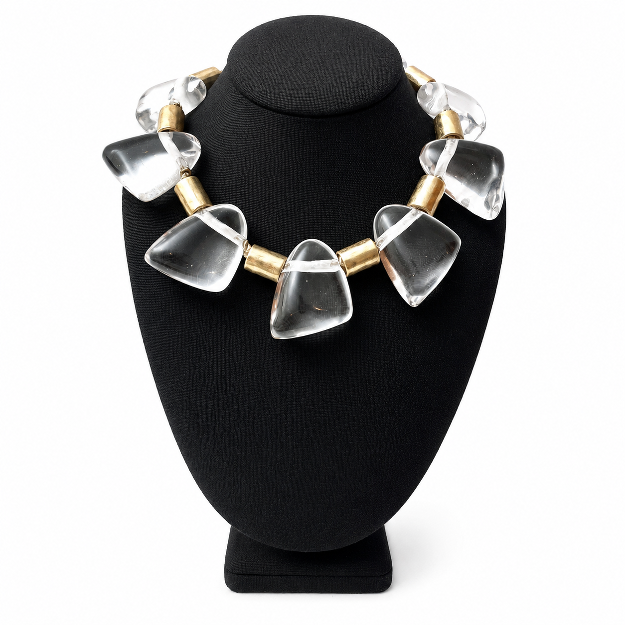 Statement necklace featuring large translucent resin beads shaped like tapered cones, alternating with cylindrical gold spacers. The design is completed with a gold clasp and extender chain, creating a modern, sculptural look.