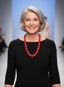 ❤️ Bold and radiant, the Coral Necklace is a handcrafted masterpiece that captures the essence of passion and purpose. Measuring just right for statement-making elegance, this exquisite piece features an arresting combination of natural, deep red coral beads—each expertly polished and sculpted into sleek cylindrical shapes. The rich color tones evoke a sense of vitality, warmth, and confidence, making it a standout accessory for day or night. A sophisticated black stone toggle clasp anchors the design with subtle contrast, balancing the fiery coral with understated refinement. The juxtaposition creates an alluring harmony that draws the eye and complements any wardrobe palette. More than just a stunning piece, the coral carries deep cultural and spiritual meaning. Revered for its ability to promote awakening and guide one toward a successful life, it has been worn throughout history as a symbol of strength and insight. This design is no coincidence—it reinforces the necklace’s fiery spirit and its energizing impact on both style and soul.  Wear the Coral Necklace as a personal emblem of bold beauty and inner empowerment. Let its color ignite your confidence and its craftsmanship speak to your story—striking, soulful, and distinctly you.