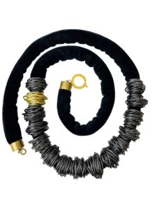 Sophistication at its core.  This extra-long necklace has wired beads that can be spaced out along the cord or clustered together.  You can wear it long or double up to wear it as a collar.   It is elegant and sophisticated, measuring 44IN/16Oz.