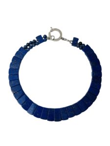 Polished, genuine Lapis Lazuli necklace. It measures 17 IN/3 OZ.  The center bead measures 21 mm.