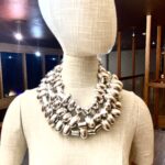 Sophisticated and elegant display of silver oval-shaped beads. You can wear the necklace with casual or formal attire in one, two, or even three strands. The necklace necklace measures 65 IN/20 OZ. The necklace will show extra cord to make the neck curve if you wear it in multiple layers.