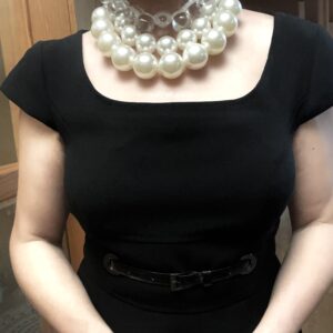 A set of 2 strands of medium-sized simulation pearls, with a separate choker necklace of one clear resin, tooth-shaped clear beads. You can wear the set or wear one or the other. The clear beads necklace contrasts the pearls' formality but also brings out the shine of the beads. The combination of styles is a unique statement for day or night. The necklace includes an extension to elongate both necklaces as a set or only one. This item sells as a set. The clear beads choker measures 16 IN/5 OZ. The double-strand necklace measures 17 IN/ 10 OZ Extension up to 5 IN A set 16 IN/15 OZ