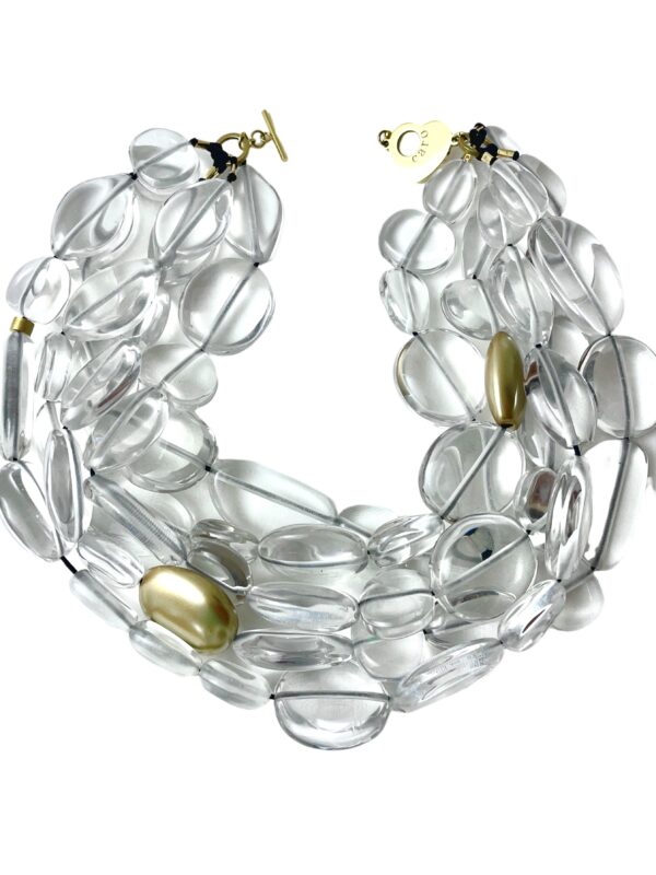 Medium-size glass-like irregular clear and gold beads are in a multistrand design for day or night.  The medium-sized beads resemble icicles with accent gold beads breaking the clear pattern. The necklace measures 21 IN/23 OZ.