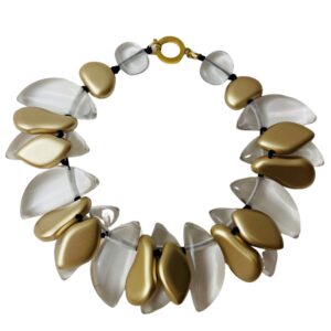 Large clear and gold leaf-shaped beads cluster into one strand. This statement necklace is for day or night. It measures 20IN/15OZ.