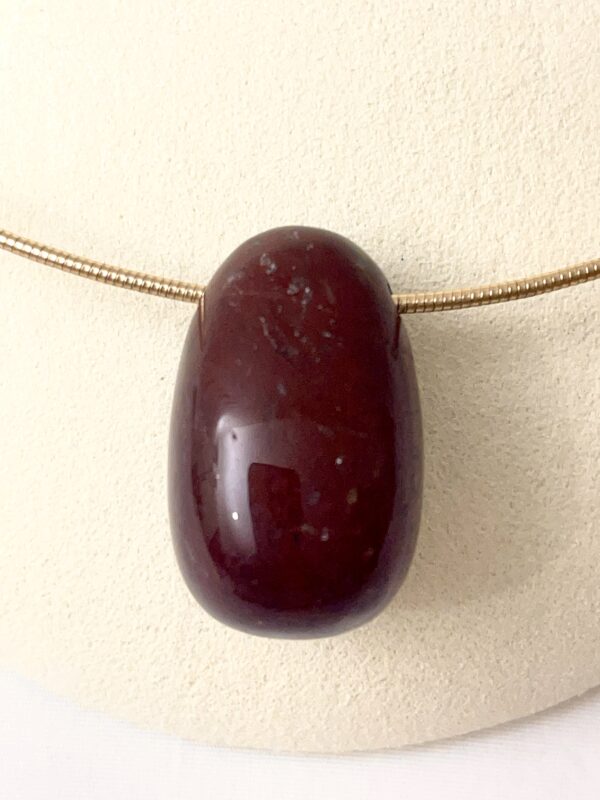 Dragon Blood: This stone is a deep maroon color.  The legend behind the stone is that the dragon's blood penetrated the earth, giving the stone its rich red color.