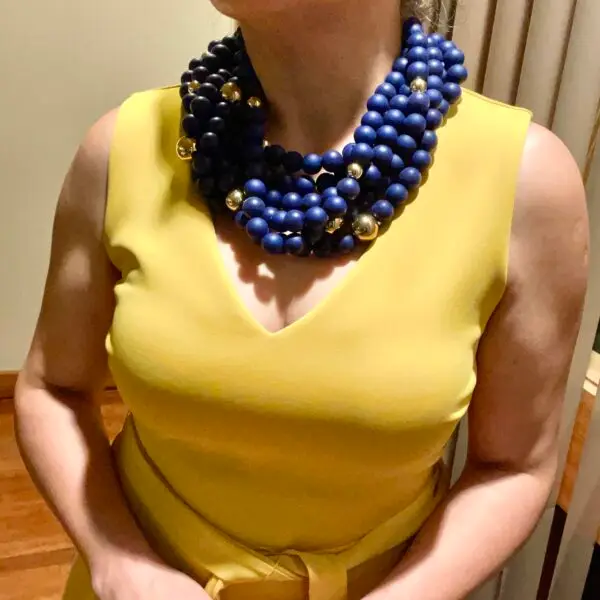 This exquisite blue beaded necklace features navy blue silicone beads interspersed with elegant gold accent beads, creating a striking and exotic design. Perfect for making a bold statement, this necklace is visually appealing and versatile enough to complement various outfits. Elevate your accessory collection with this eye-catching piece that is sure to turn heads.