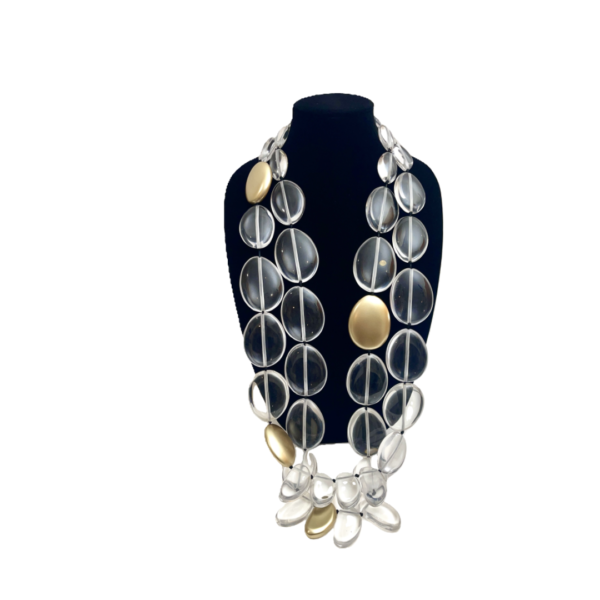 This exquisite, extra-long necklace features a stunning combination of clear beads interspersed with elegant gold accent beads, creating a sophisticated and eye-catching accessory. The harmonious blend of clear and gold tones adds a touch of luxury.  