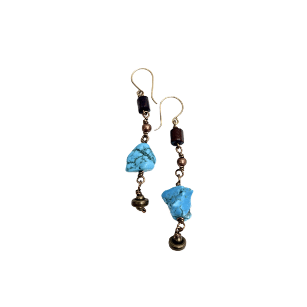This exquisite multi-strand necklace is practical in every sense, seamlessly blending style and functionality. Handcrafted with care, it features polished wooden beads that showcase their warm, natural tones alongside vibrant turquoise accents that inject a burst of color into any look. The combination creates a striking visual appeal that feels both grounded and fresh. Measuring 38 inches when worn as a single strand, the necklace hangs gracefully, draping around the neck in elegant layers. Its versatile horseshoe clasp design offers a practical way for styling options, allowing you to double it up into a chic choker for a completely different vibe. This duality makes the piece practical for everyday wear and ideal for special occasions alike. Each bead is meticulously chosen to ensure uniformity in shape and color, resulting in a harmonious flow that highlights the contrast between deep wood grains and the bright turquoise hue. The horseshoe clasp, with its smooth curves and secure closure, adds a refined touch, reinforcing the necklace’s blend of artisanal craftsmanship and modern sensibility. Whether you’re dressing up a simple blouse or accentuating a formal gown, this statement necklace elevates your ensemble with ease. It’s the perfect accessory for those who appreciate adaptive design and enduring beauty.