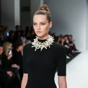 Discover the timeless beauty of the Pola necklace, a handcrafted statement piece made from three strands of natural stick-type white coral. Accented with luminous pearls and soft yellow crystals, this design celebrates the organic textures and subtle tones of off-white coral, creating a look that’s both earthy and refined.