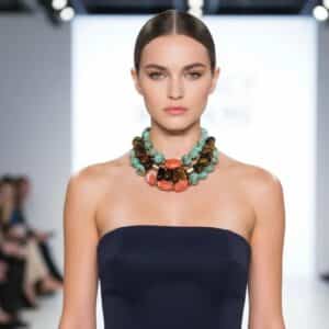 Combination Trio Necklace Three energies. Three colors. One striking harmony. This Combination brings together products 0369242, 0369243, and 0369245 into a beautifully curated trio designed for effortless layering. Each necklace is crafted from natural stones—soothing Amazonite, vibrant Coral, and shimmering Tiger Eye—creating a stunning interplay of color, texture, and personality. The cool blue‑green of Amazonite, the fiery warmth of Coral, and the golden depth of Tiger Eye form a palette that feels both bold and balanced, earthy yet elevated. All three pieces are fully adjustable, allowing you to layer them with ease and customize the drape to suit your neckline and style. Worn together, they create a dimensional, artful statement that instantly transforms any outfit. Worn individually, each necklace stands on its own as a unique expression of natural beauty. This Combination offers versatility, artistry, and value. You can purchase each piece separately by searching its product number, or choose the full trio for a better price and a complete, ready‑to‑wear layered look. Whether you’re drawn to the calming presence of Amazonite, the energizing spark of Coral, or the grounding strength of Tiger Eye, this trio brings them together in a way that feels intentional, expressive, and unmistakably striking.