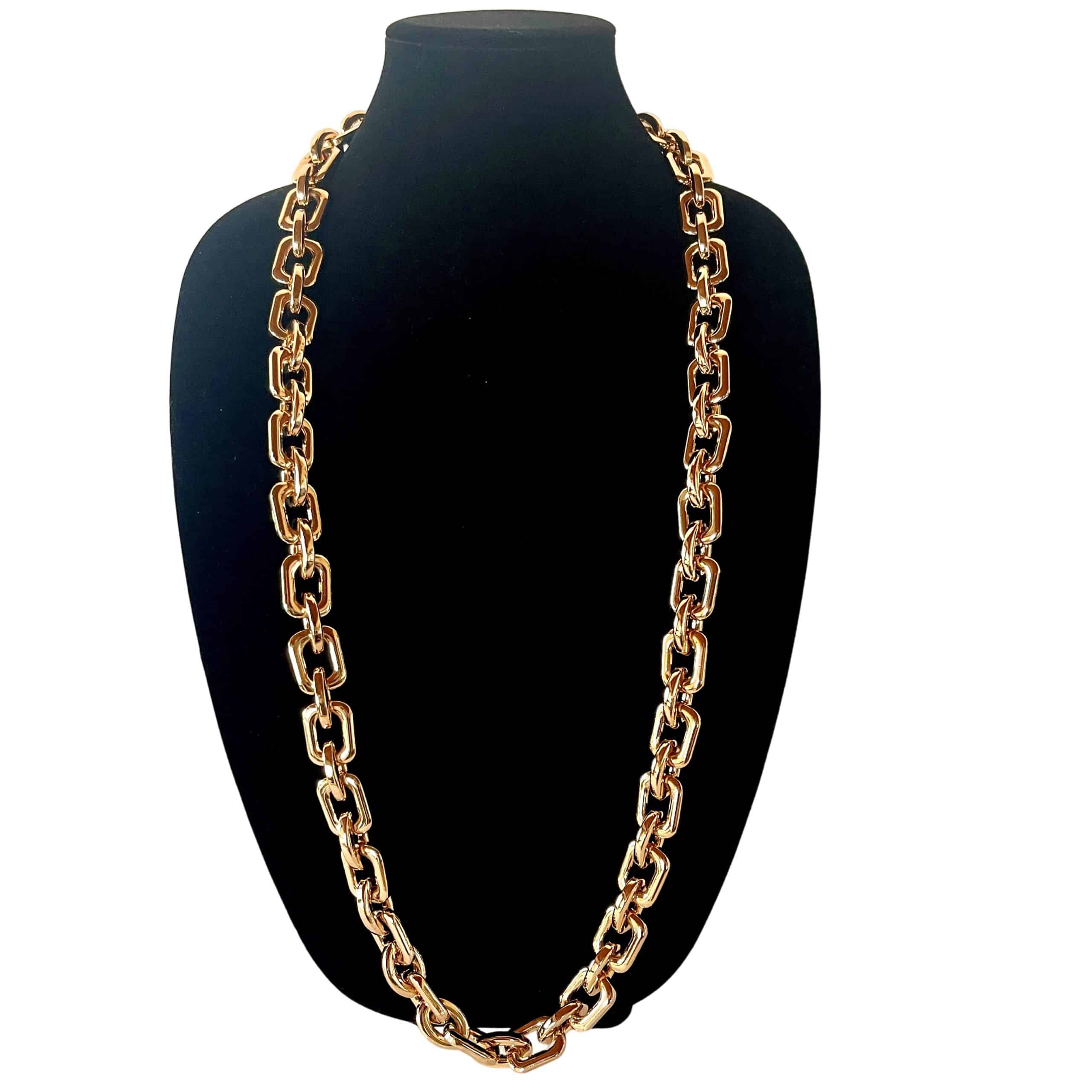 **Ghost Crystal 0369259 – Long Gold‑Link Necklace with Removable Pendant** A dramatic blend of metalwork and natural geology defines *Ghost Crystal 0369259*, a long statement necklace designed for bold, expressive styling. The piece features a substantial gold‑tone chain composed of oversized links, creating a luxurious weight and a sculptural silhouette. At 39 inches and 18 ounces, it drapes with presence and intention, offering the versatility to wear it as a single long strand or doubled for a layered effect. The chain can be worn with or without its signature pendant, allowing you to shift effortlessly between minimalist and statement looks. The focal point of the design is the striking **Ghost Crystal** pendant—an organically shaped geode with a hollow center and shimmering crystalline edges. These unique formations occur when the outer shell of a crystal grows more rapidly than its interior. The center lacks the minerals needed to solidify, leaving behind a natural cavity that reveals the raw, glittering structure within. This geological phenomenon gives each **Ghost Crystal** its ethereal, otherworldly appearance and ensures that no two pendants are ever alike. The combination of heavy gold links and the pendant’s natural texture creates a compelling contrast between refinement and rugged beauty. Whether worn as a dramatic accessory or as a sculptural everyday piece, *Ghost Crystal 0369259* brings depth, character, and a touch of geological mystery to any collection.