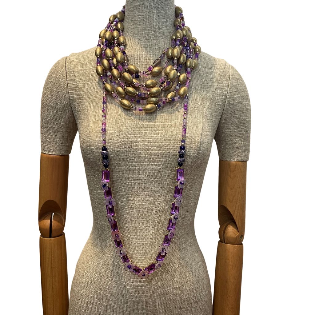 Indulge in the luxurious charm of the Purple Delight necklace — a radiant statement piece designed to captivate and elevate any ensemble.